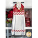 The completed hanging towel in red, hung from a kitchen drawer and staged with coordinating decor and flowers.