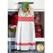 The completed hanging towel in white, hung from a kitchen drawer and staged with coordinating decor and flowers.