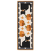 The completed Scaredy Cat Table Runner, colored with orange, black, gray, and cream fabrics, isolated on a white background.