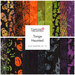 A stacked collage of black, green, orange, and purple batik fabrics with a Tonga Haunted card in the center
