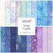 A stacked collage of cream, blue, and purple batiks with a Tonga Crystal by Timeless Treasures tag in the center