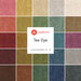 A square collage of red, brown, yellow, teal, blue, and pink fabrics with a Tea Dye by Andover Fabrics badge in the center