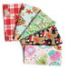 Five colorful fabrics featuring holiday patterns, including gingerbread men, Christmas trees, and mugs.