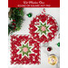 Two quilted hot pads, one round and one square, featuring a star design in red, white, and green Christmas fabrics displayed on a white marble counter with coordinating seasonal decor. A red banner at the top reads 