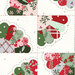 Colorful patchwork design featuring scalloped shapes in red, green, pink, and white with floral patterns.