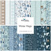 A collage of winter-themed fabric patterns in blues and whites, featuring trees, snowflakes, and animals.