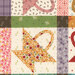 A colorful patchwork fabric featuring various floral and geometric patterns in multiple colors.