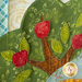 A super close up on the applique apple tree, demonstrating fabric and topstitching details.