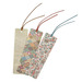 Three decorative bookmarks with various patterns, including floral and patchwork designs.