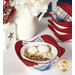 The completed bowl cozies, colored in patriotic fabrics from the Grand Haven collection, staged on a white table with coordinating flowers and decor. A stack of bowl cozies sits in the background.