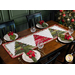 The completed Tree Farm Table Runner in Pine Valley fabrics, staged on a rustic wood table with coordinating tableware, glasses, napkins, and a decorated Christmas tree.