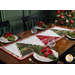 The Table Runner at a slight angle, staged on a rustic wood table with coordinating tableware, glasses, napkins, and a decorated Christmas tree.