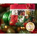 A close up on the tiny tote bag hanging on a decorated Christmas tree, showing details on the glittering golden snowflake charm.