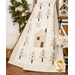 The Silent Night quilt, artfully draped from a wooden quilting ladder, staged with coordinating winter themed decor.