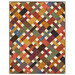 Colorful quilt featuring a patchwork design with rich earth tones isolated on a white background