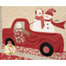 An angled close up on the snowmen riding in the red truck, demonstrating fabric, applique, piecing, embellishment, and top quilting details.