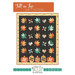 Colorful quilt pattern titled Fall in Love, featuring leaves, hearts, and pumpkins on a black background.