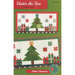 Cover of a quilting pattern labeled Under the Tree, featuring a Christmas tree with gifts and stars.