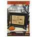 The front of the pattern showing the finished project staged amongst coordinating Halloween decor.