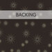A swatch of black fabric with tossed gold metallic starbursts. A pale gray banner at the top reads 