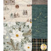 A close-up of a patchwork quilt in soft muted colors