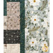 A quilt featuring a patchwork design in muted colors with a floral border