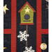 A close up the birdhouse block, demonstrating fabric, applique shape, sashing, and top quilting details.