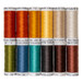 Twelve spools of thread in a range of rust, yellow, ecru, green, blue, black, isolated on a white background.