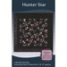 Quilt pattern cover featuring a Hunter Star design with black, pink, and cream colors by Brenda Henning.