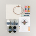 The materials included in the project bag, artfully laid out on a white background.