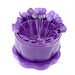 The purple Gypsy Quilter Magnetic Pin Cup opened and full of purple hexagonal-faced quilting pins, isolated on a white background.