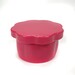 The pink Gypsy Quilter Magnetic Pin Cup closed with the lid on top, isolated on a white background.