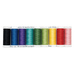 Nine spools of thread in a rainbow of colors, isolated on a white background.