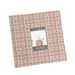 A stack of fabric squares labeled Prairie Gatherings Flannels isolated on a white background