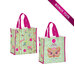 Colorful reusable tote bag featuring floral and bird patterns, with a design celebrating a 50th anniversary.