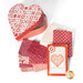 The Endless Love Quilt Kit heart-shaped keepsake box, open staged with the fabrics and pattern included in the kit.