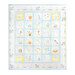 A childrens quilt featuring alphabet blocks with various whimsical patterns isolated on a white background.