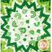 A top down view of the center of the topper, demonstrating details on the focus fabric, a white print with various green St. Patrick's Day motifs like hats, rainbows, and shamrocks.