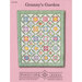 Quilt pattern titled Granny's Garden features floral motifs in a grid on a pink background.