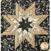 A super close up on the center of the hot pad, demonstrating fabric details on the beautiful folded star center.