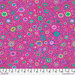 Violet fabric featuring various colorful circles and shapes, creating a playful pattern.