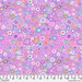 Colorful abstract fabric featuring circular shapes in various sizes on a pink background with a 12
