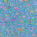 Colorful polka dots of varying sizes in shades of pink, green, and blue against a turquoise fabric