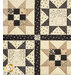 A head-on shot of four sawtooth stars with nine patch and panel block centers, demonstrating fabric, sashing, and top quilting details.