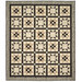 The completed Garden Stars quilt colored in warm tan and charcoal fabrics, isolated on a white background.