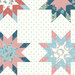 White fabric with large patchwork quilting stars on a background of simplified blue fleur de lis.