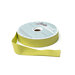 A spool of chartreuse ribbon with a portion unspoiled isolated on a white background.