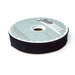 Spool of black bias tape isolated on a white background