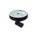 A spool of black ribbon with a portion unspoiled isolated on a white background.