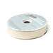 Spool of cream bias tape isolated on a white background